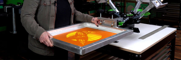 A GUIDE ON REGISTERING MULTI-COLOR DESIGNS ON A SCREEN PRINTING PRESS WITHOUT MICROS